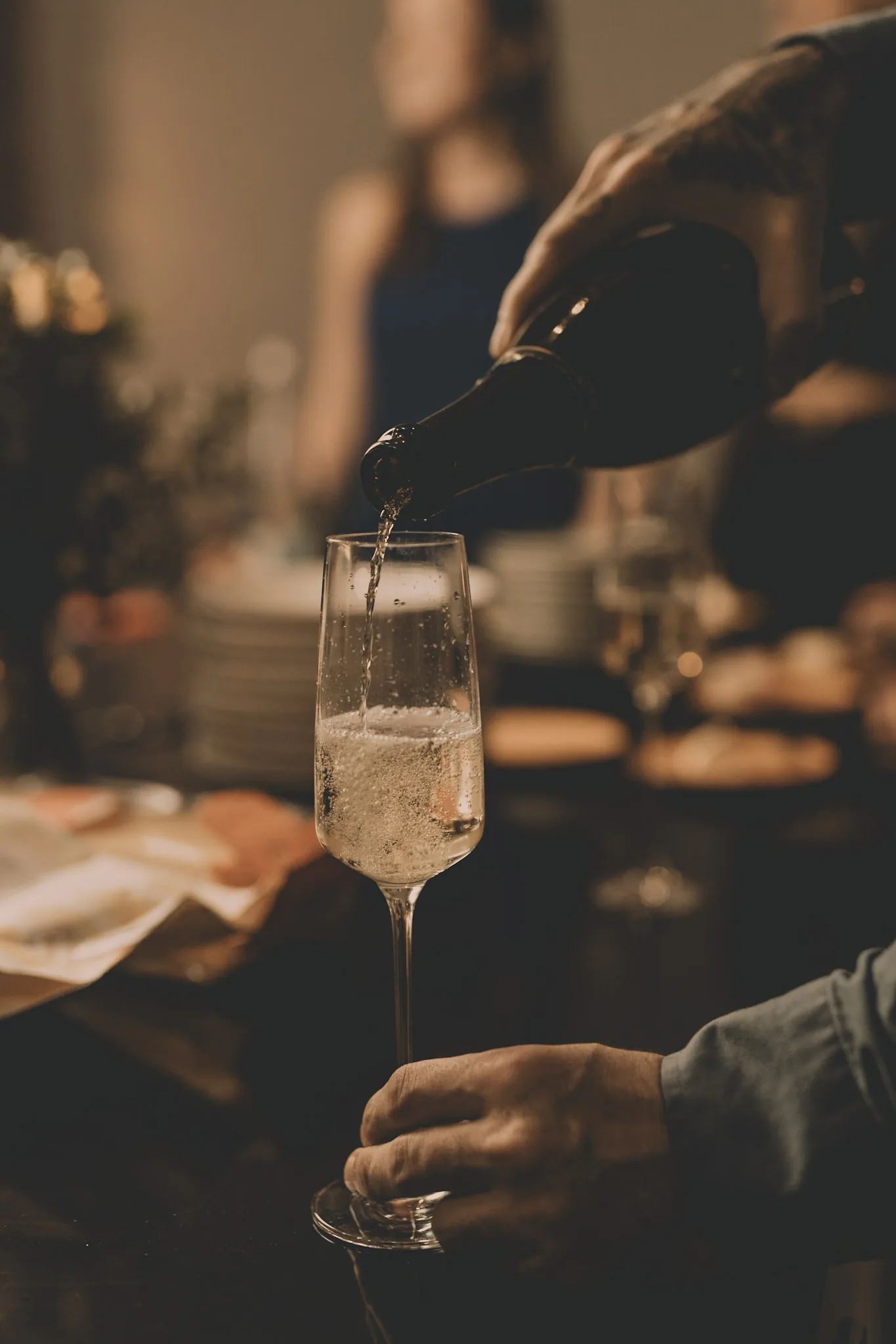 Pouring champagne at the table
